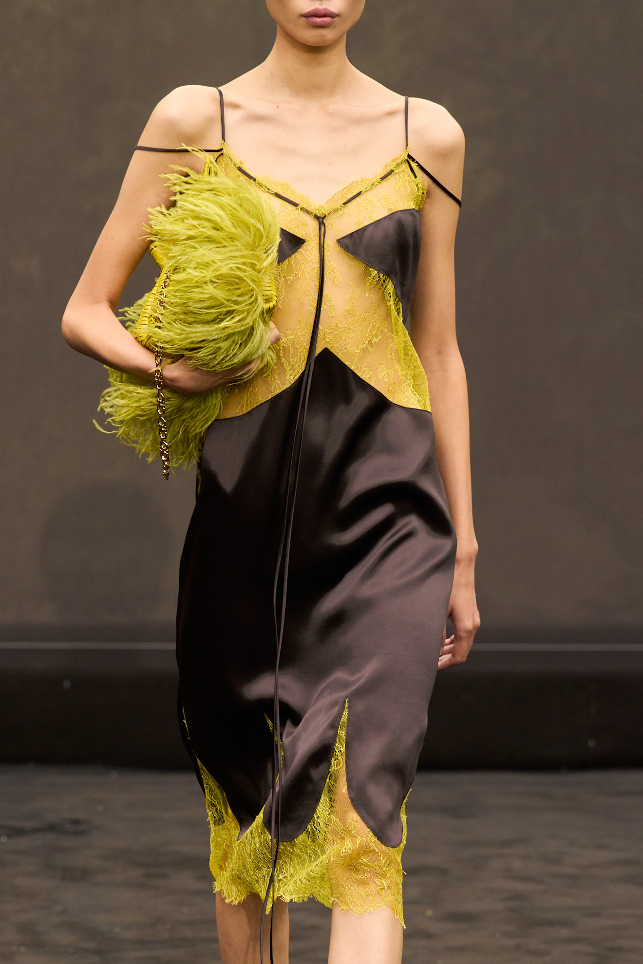 A model wore black and yellow on the Ferragamo Spring 2026 runway