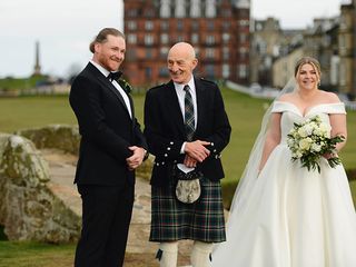 A couple getting married on the swilcan bridge at st andrews old course