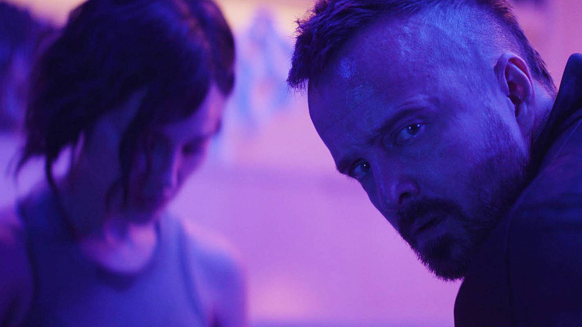 Eiza Gonzalez and Aaron Paul in "Ash" (2025)