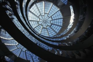 a view of the Guggenheim museum's spiral ramp and dome