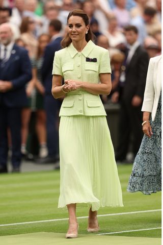 Catherine, Princess of Wales wears a lime green dress following the Women's Singles Final, Wimbledon on July 15, 2023 in London, England.