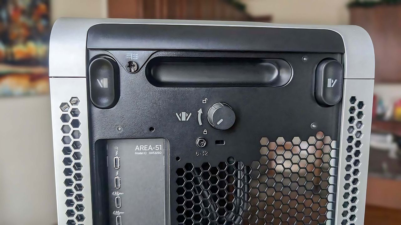 Closeup of the windows unlock buttons on the back of the release Alienware Area-51 Gaming Desktop (2025).