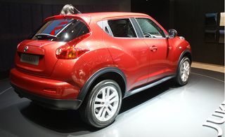 Backside of red Nissan Juke