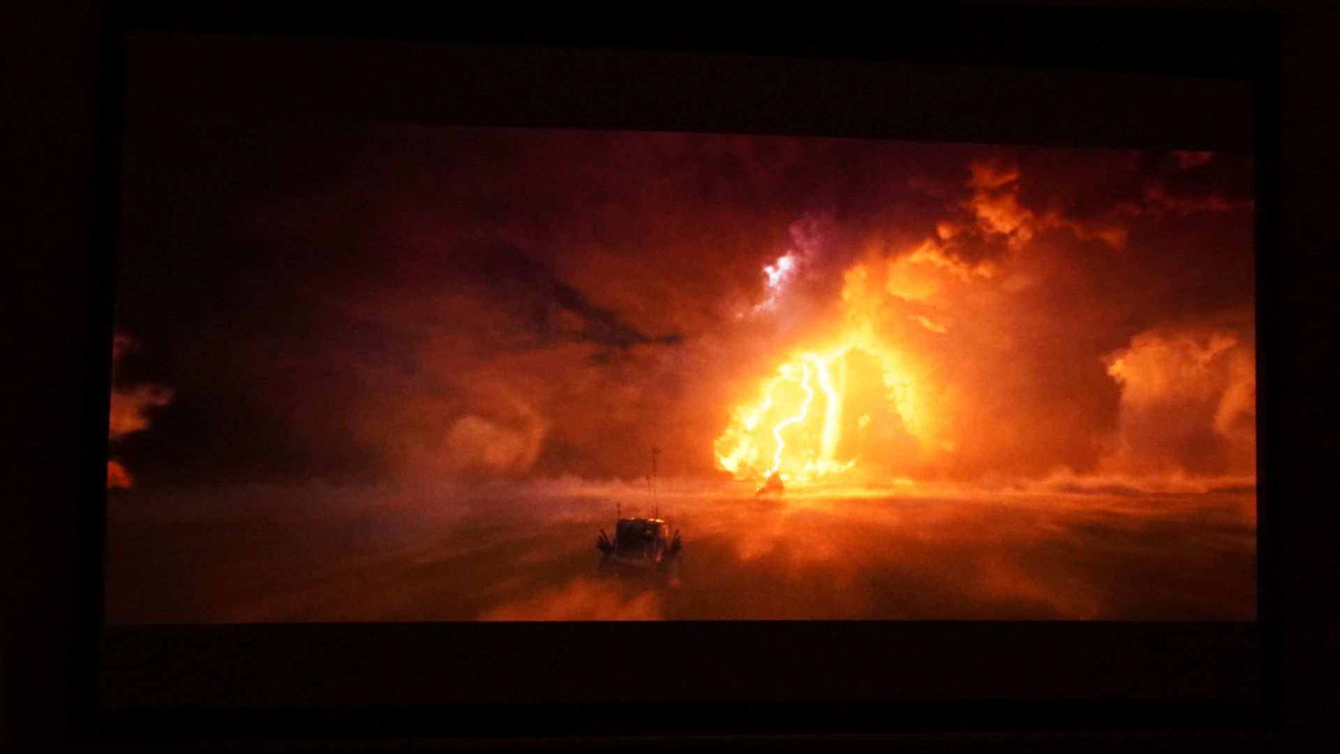 A projection showing a lightning storm from a movie scene.