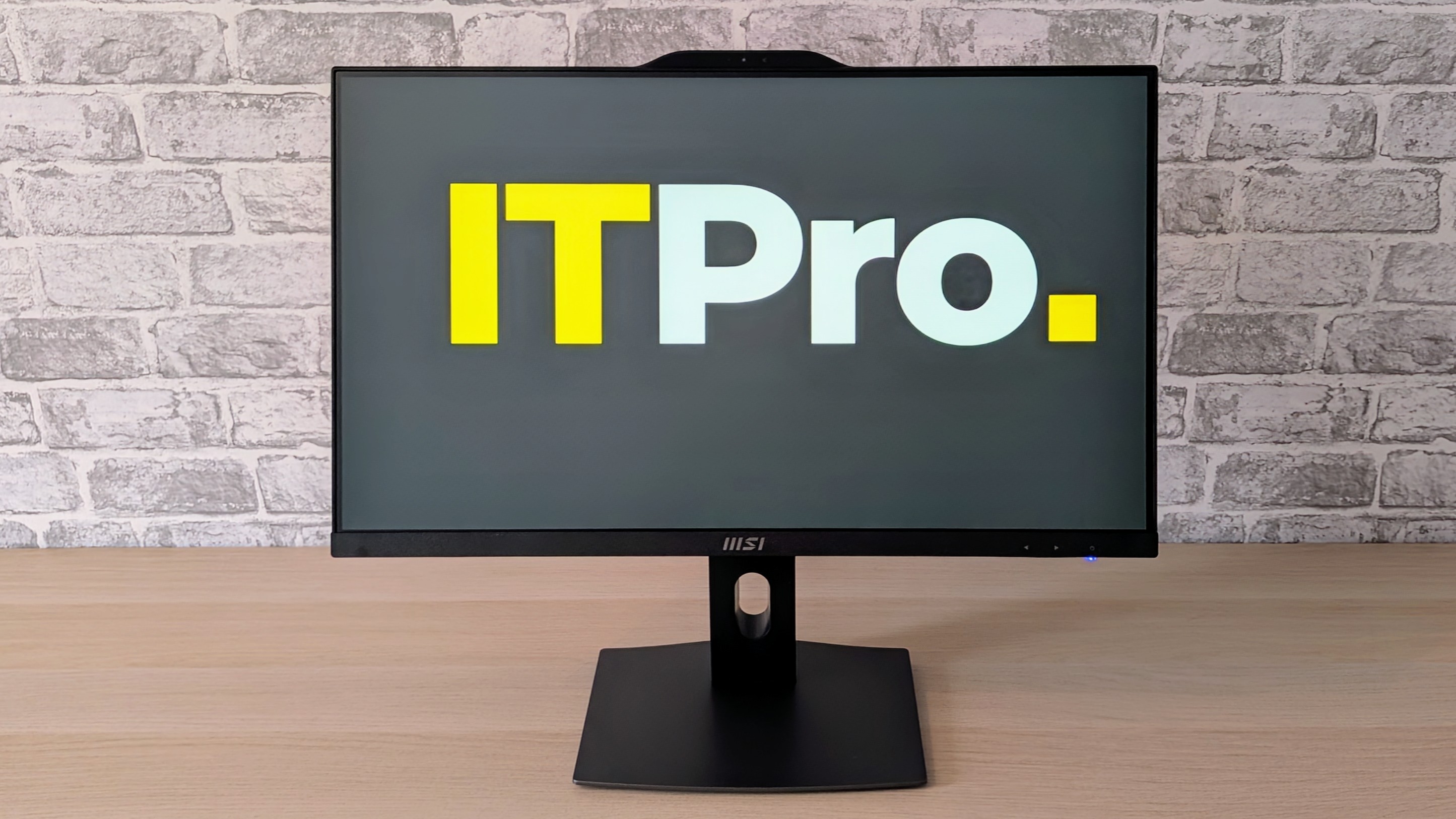 The MSI Pro AP242P 14M on a desk
