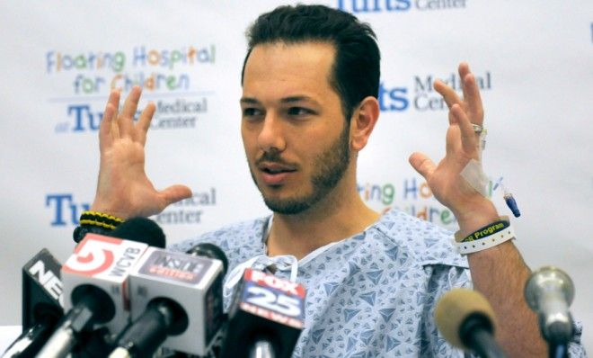 Nicholas Yanni of Boston describes the blast and his injuries during a press conference at Tufts Medical Cetner on April 16.