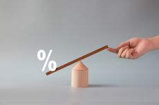 A scale with the percent symbol being lowered