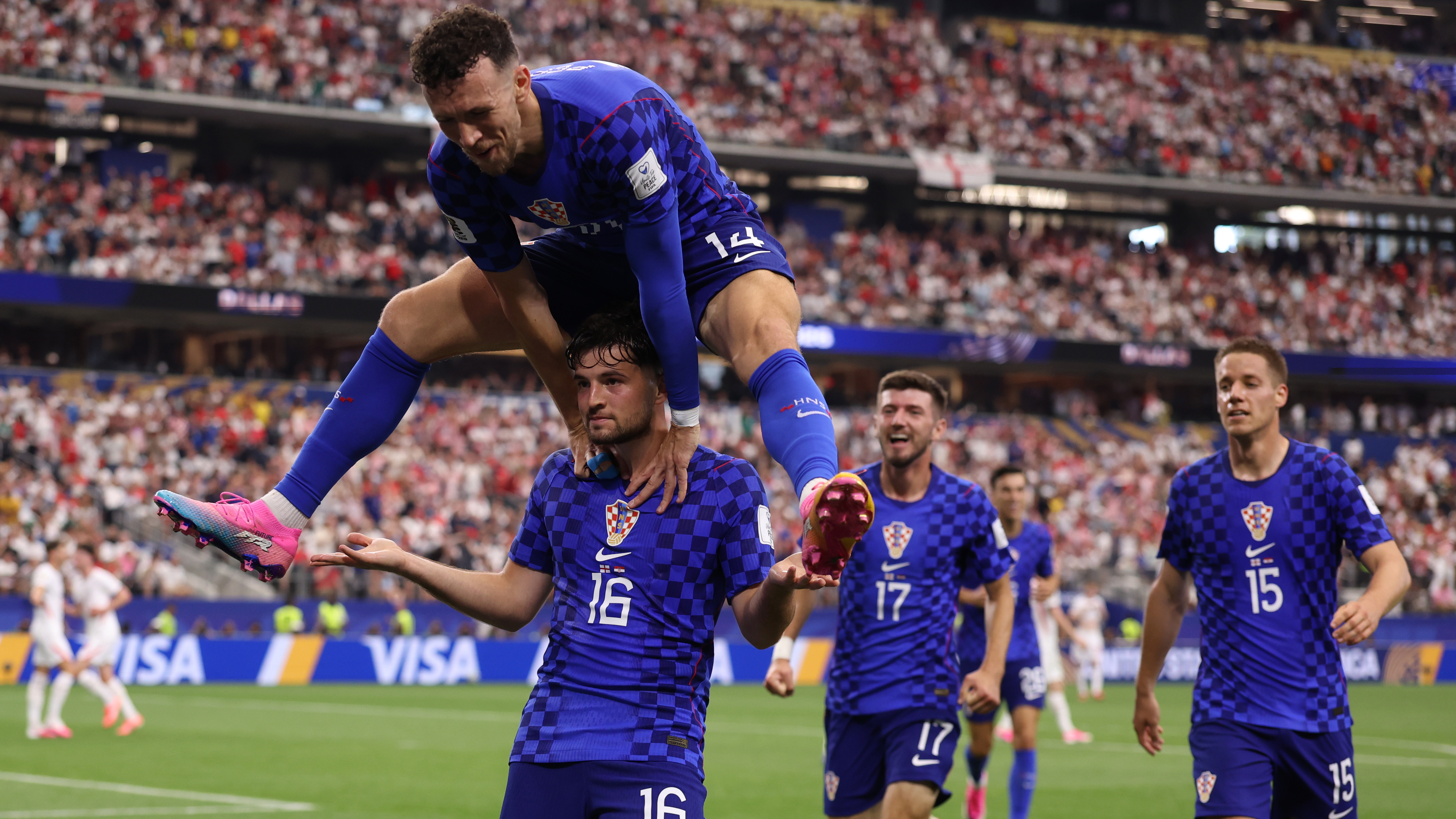 Martin Baturina of Croatia celebrates after scoring a goal to make it 1-1 with Ivan Perisic of Croatia during the FIFA World Cup 2026 Group L match between England and Croatia