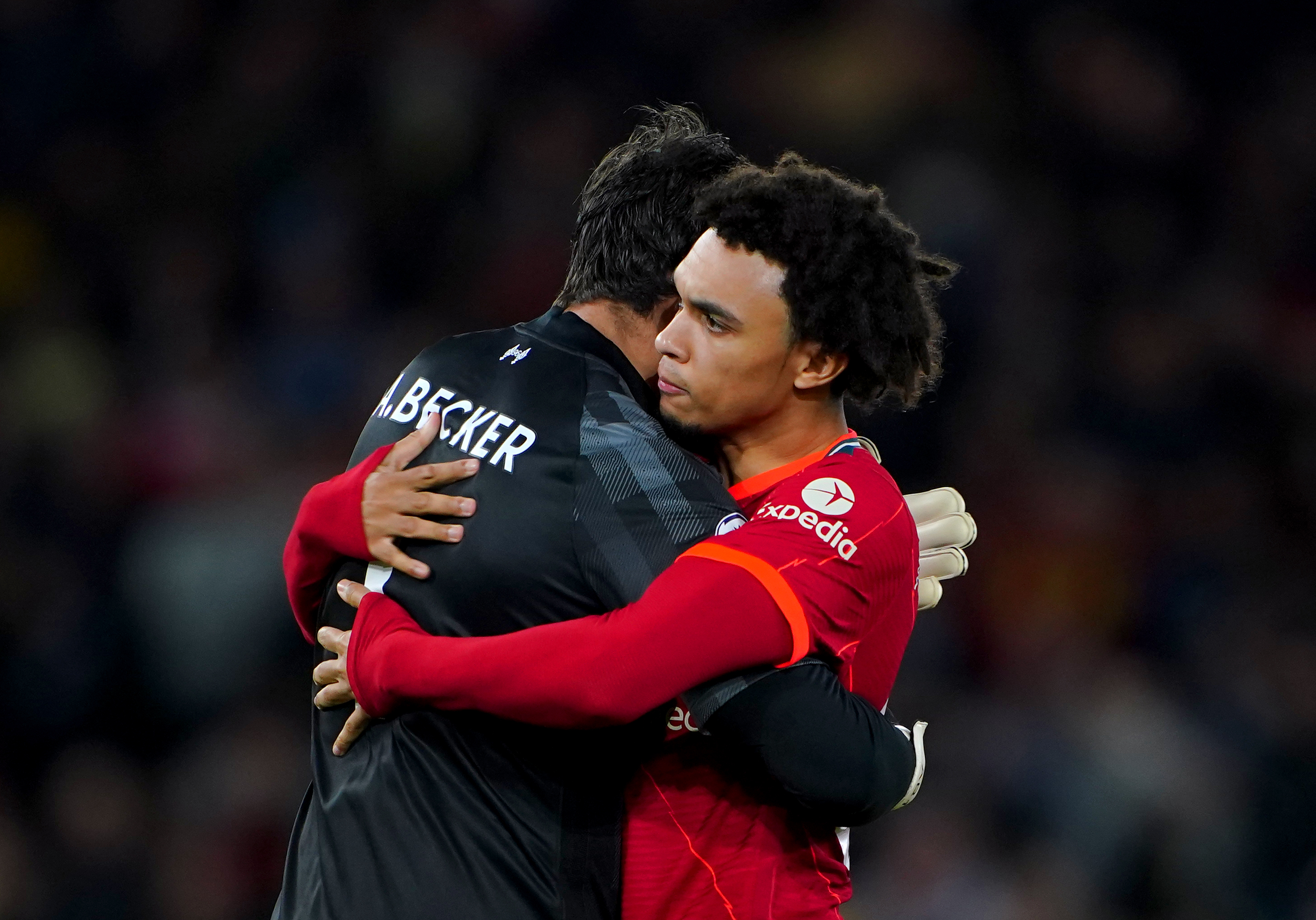 Liverpool goalkeeper Alisson (left) and Trent Alexander-Arnold hug before the Premier League match at Anfield, Liverpool. Picture date: Saturday November 20, 2021