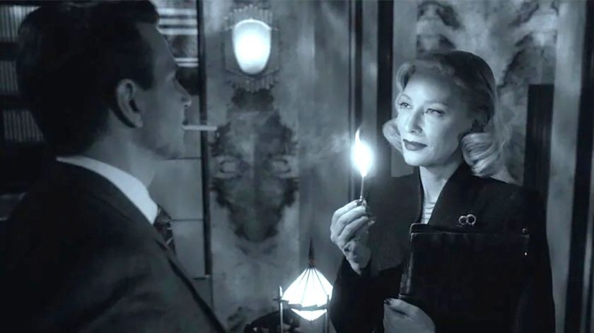 (L-R) Bradley Cooper and Cate Blanchett in &quot;Nightmare Alley: Vision in Darkness and Light.&quot;