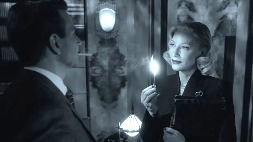 (L-R) Bradley Cooper and Cate Blanchett in "Nightmare Alley: Vision in Darkness and Light."
