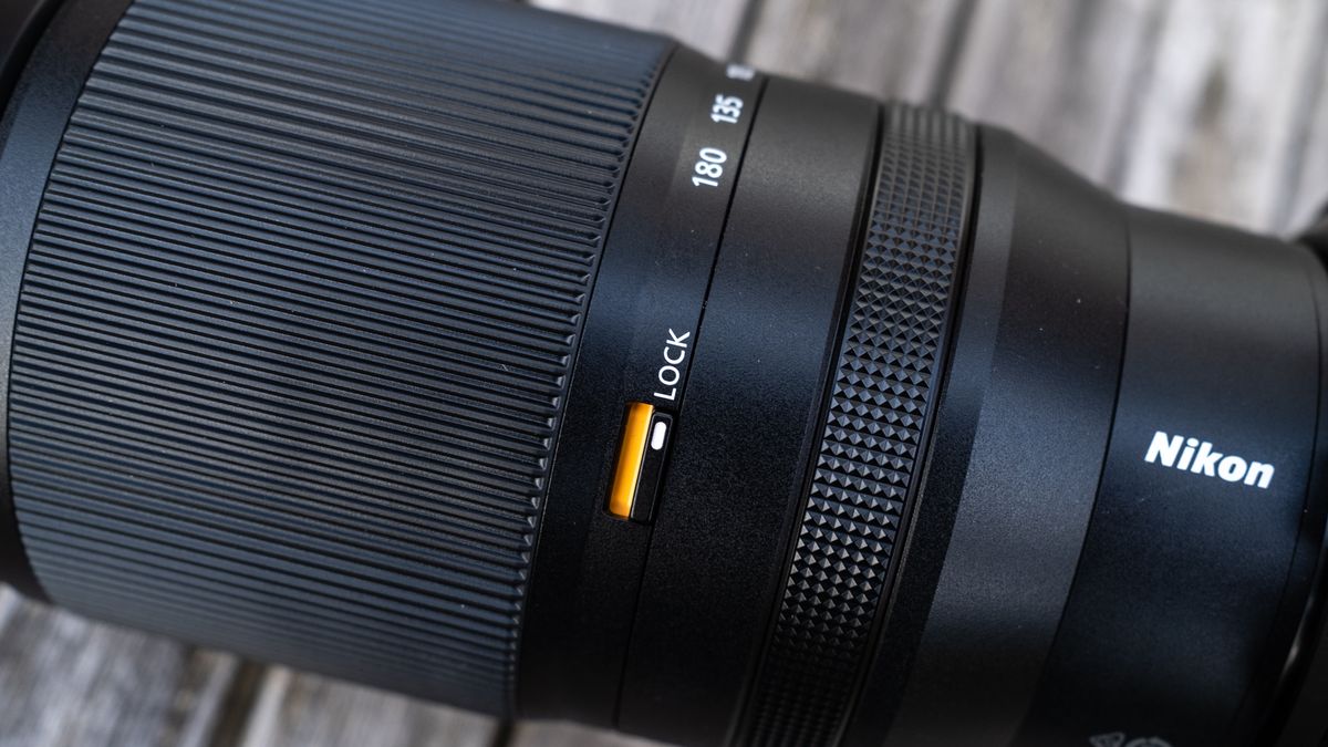 Nikkor Z 70-180mm f/2.8 attached to a Nikon Z 7II on a wooden outdoor table