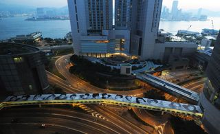 Depiction of a bridge along with tall buildings