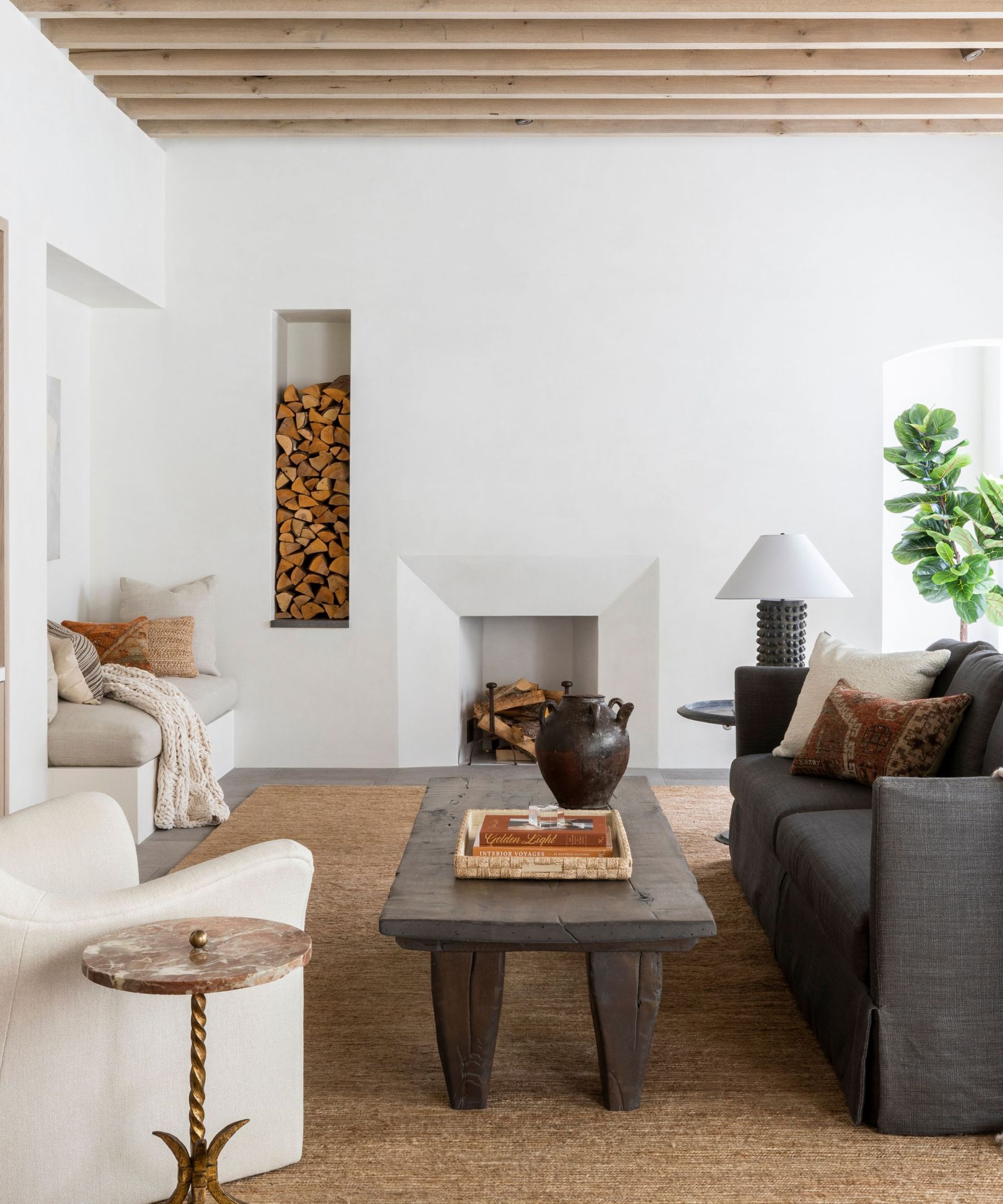 Neutral living room with cozy nook in alcove