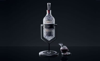 Crystal wine holder on a black stand