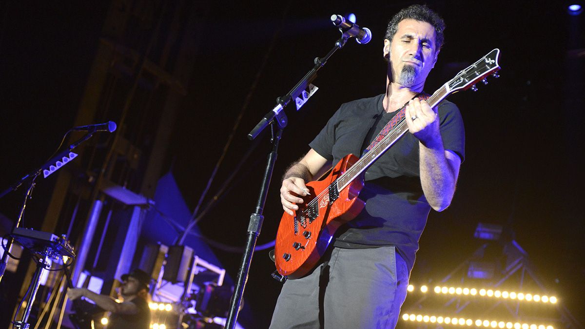 Daron Malakian (L) and Serj Tankian of System of a Down perform during Riot Fest at the National Western Complex on August 28, 2015 in Denver, Colorado