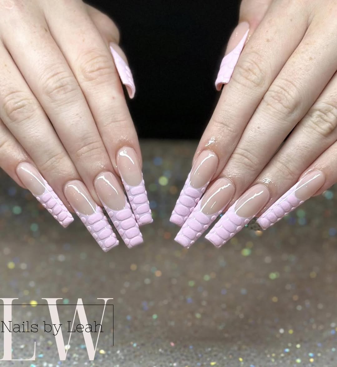 pink nails with a croc pattern