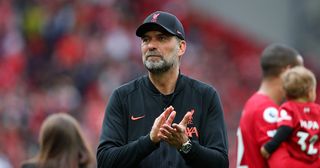 Liverpool manager Jurgen Klopp applauds the fans following the Premier League match between Liverpool and Wolverhampton Wanderers at Anfield on May 22, 2022 in Liverpool, England.