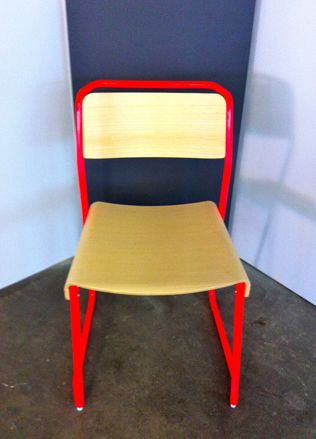 yellow chair with red frame