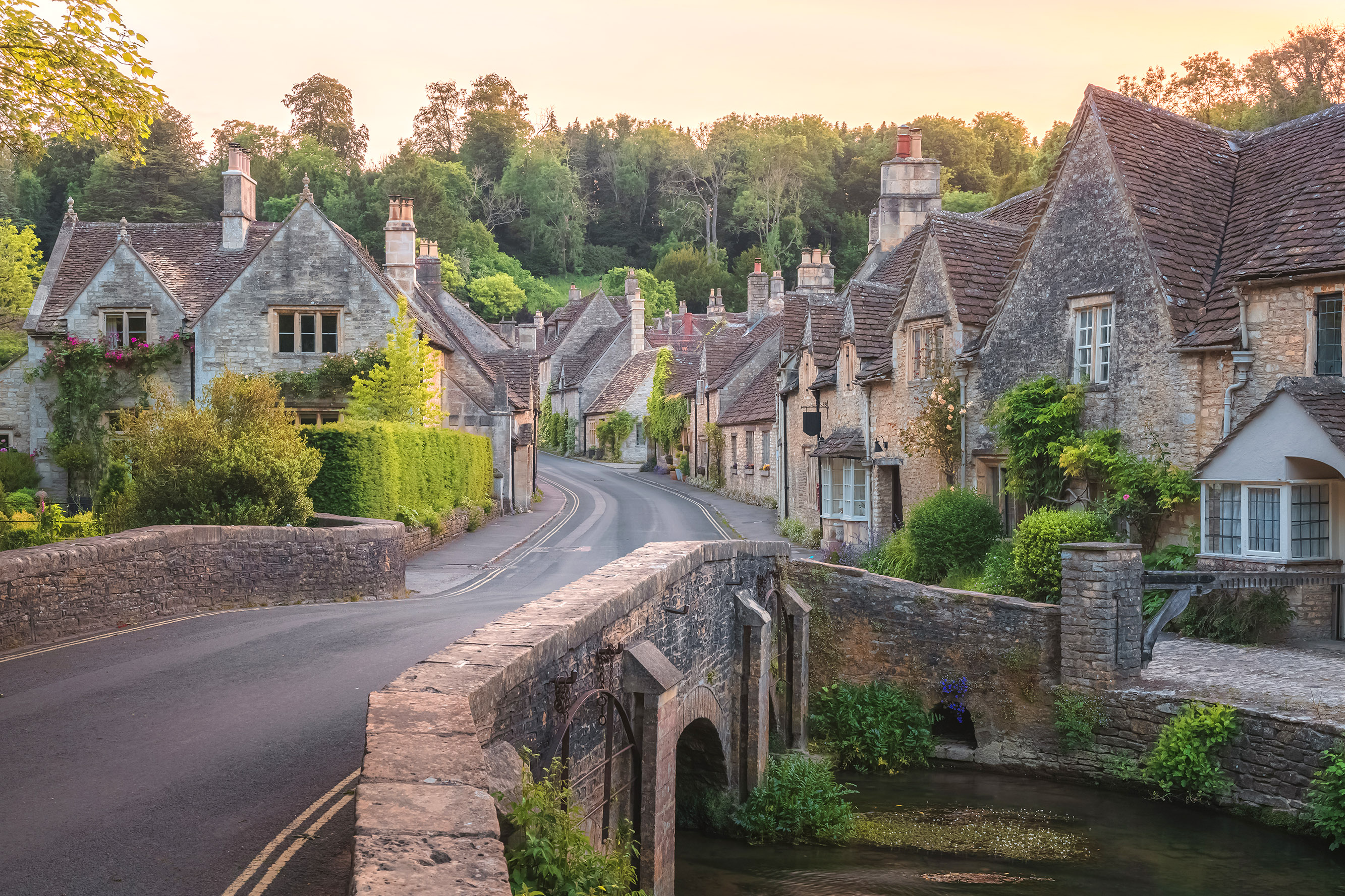 The charming, quaint, historic, medieval Cotswolds English village of Castle Combe in Wiltshire.
