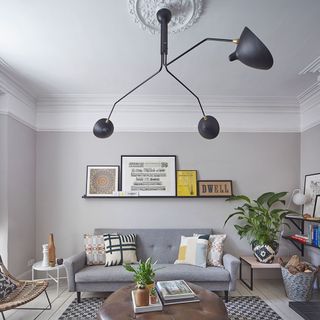 antique lights with white walls and wooden flooring