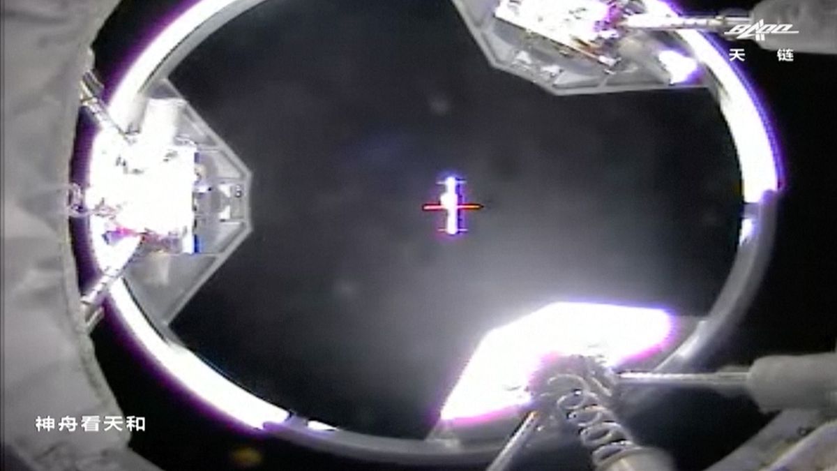 This still from a China's CCTV network shows a view from the Shenzhou 13 spacecraft as it approached the Tianhe core module of the Tiangong space station on Oct. 16, 2021.
