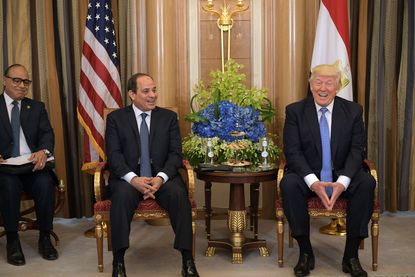 President Trump laughs with Egyptian President Abdel Fattah el-Sisi in Saudi Arabia
