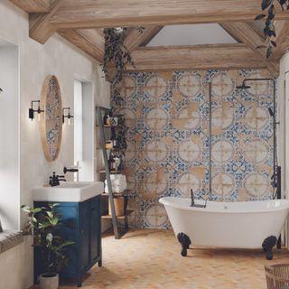 terracotta look bathroom flooring with decorative wall tiles and freestanding bath