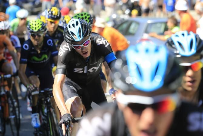 Chris Froome shadows his Sky teammates