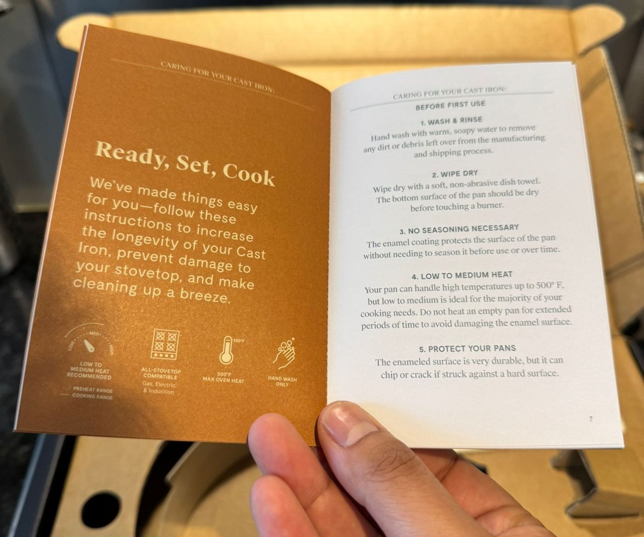 The open instruction manual for the Caraway cast iron mini skillet