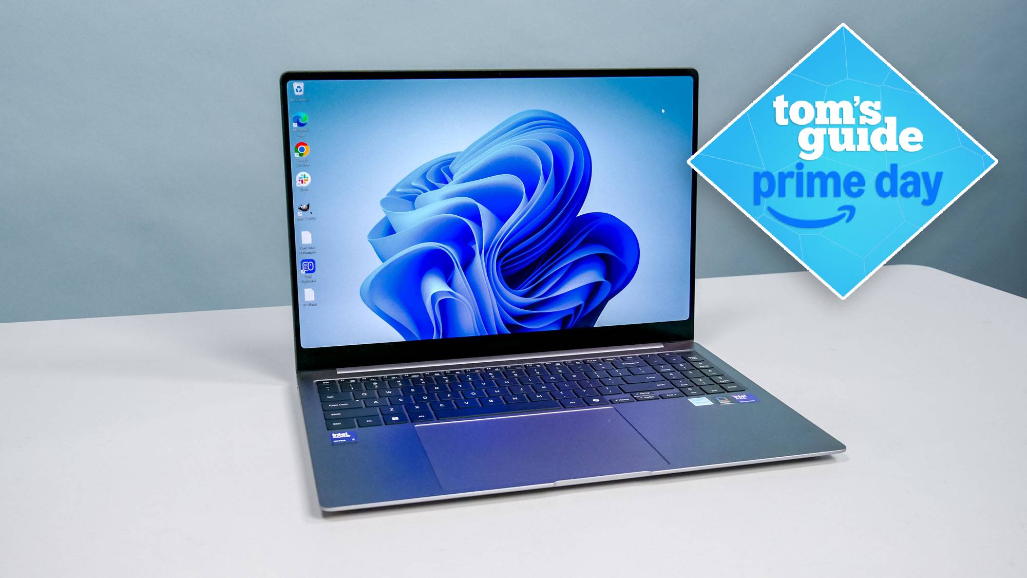Samsung Galaxy Book 5 Pro on table with Tom's Guide Prime Day badge