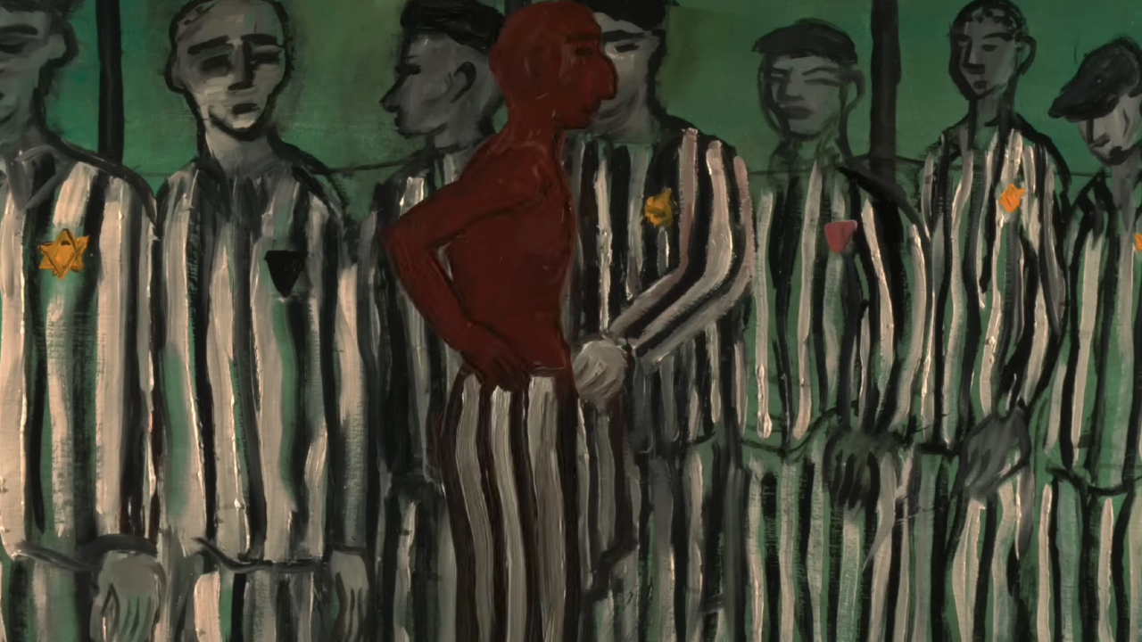 A man putting on striped pajamas in a concentration camp in Papillon