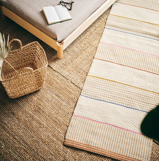 Two layered natural woven rugs