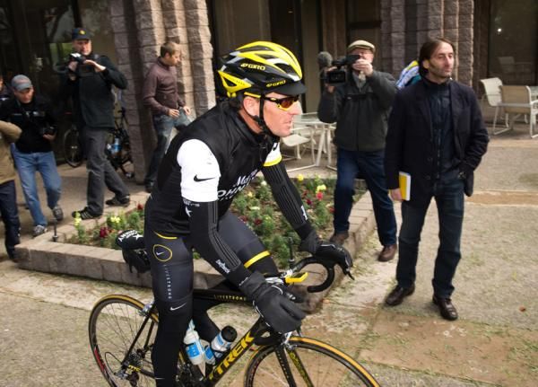Lance Armstrong heads out for a training ride.