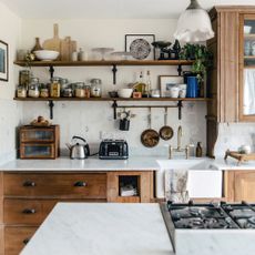 Delft tiles in wooden kitchen