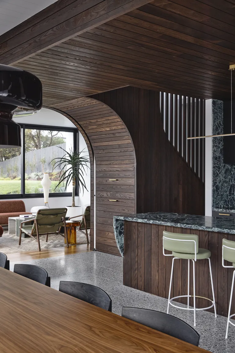 Wooden kitchen with timber archway