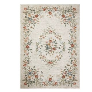 Ivory and red floral rug with muted tones