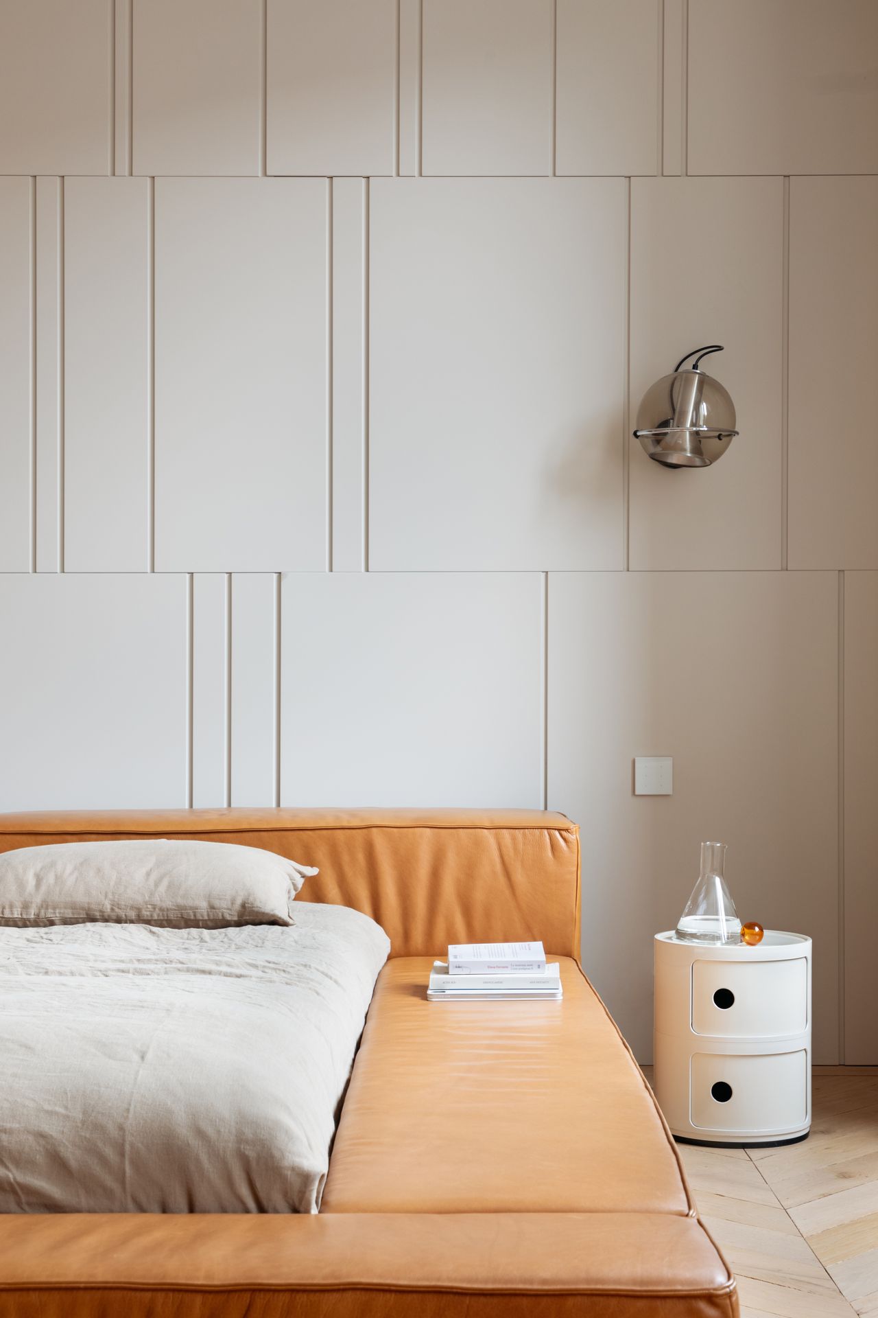 A low bed in a master bedroom