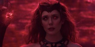 Costumed Scarlet Witch using her powers in WandaVision