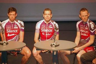 Cadel Evans is flanked by Leif Hoste