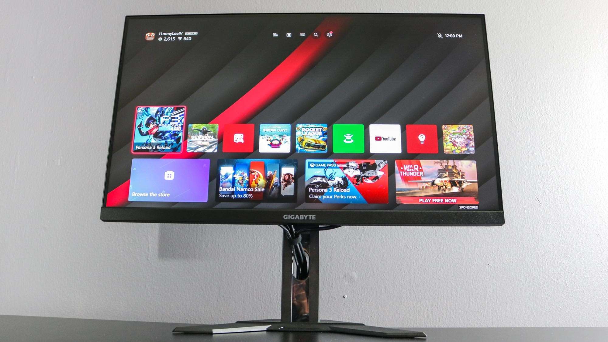 The Gigabyte M28U gaming monitor showing the Xbox Series homescreen