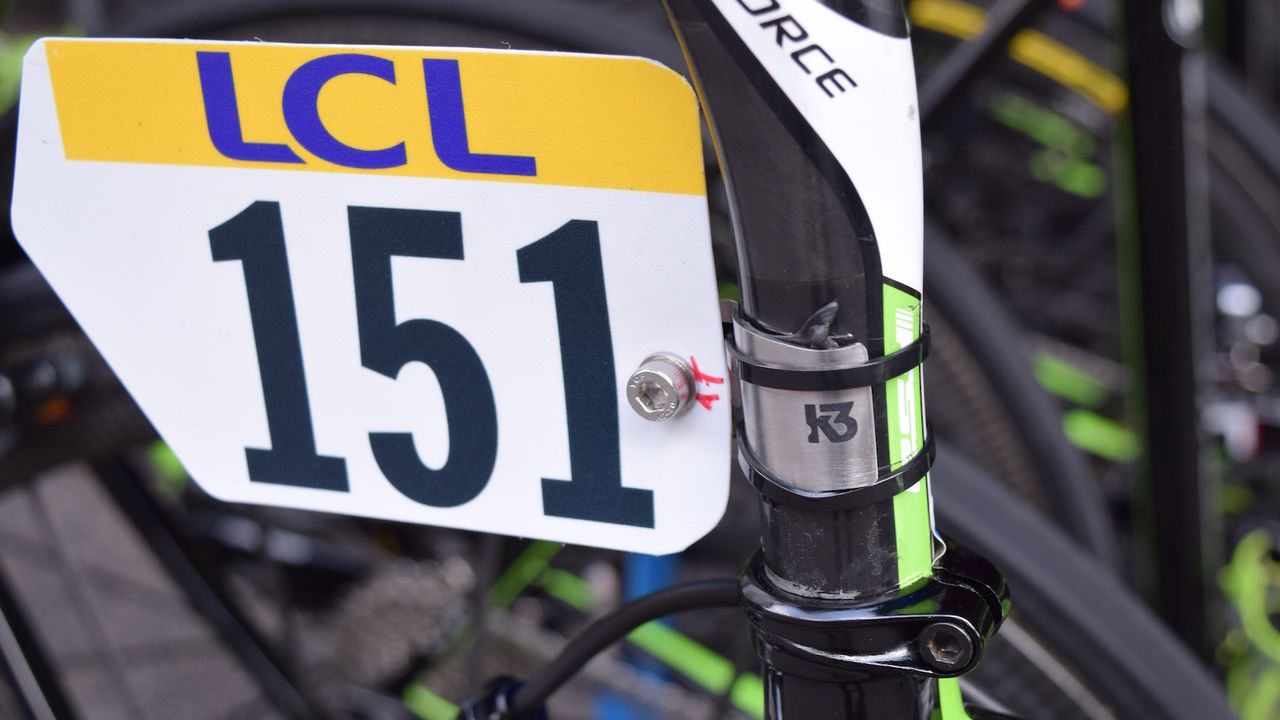 A K3 number mount is stuck with adhesive and cable ties to ensure security