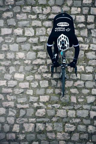 Iljo Keisse takes on the cobbles of the Arenberg Forest.