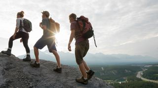 Three hikers on a ridge