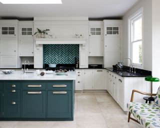 Green and white kitchen in Victorian house in London