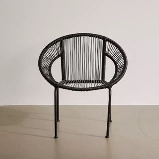Outdoor woven chair with metal legs