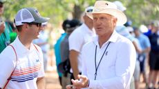 Greg Norman of Australia The Commissioner of the LIV Golf Tour in amongst the patrons during a practice round prior to the 2024 Masters Tournament