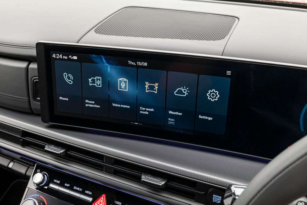 The Santa Fe's digital dash is paired with useful dials and buttons