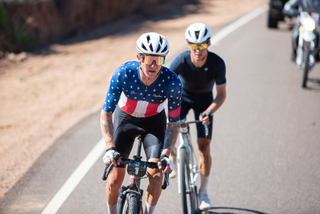 Keegan Swenson, wearing US gravel national champion's jersey, battles at front of BWR Arizona against Lance Haidet in pro men's division, photo by Jonathan Rojas and Brett Protasiewicz