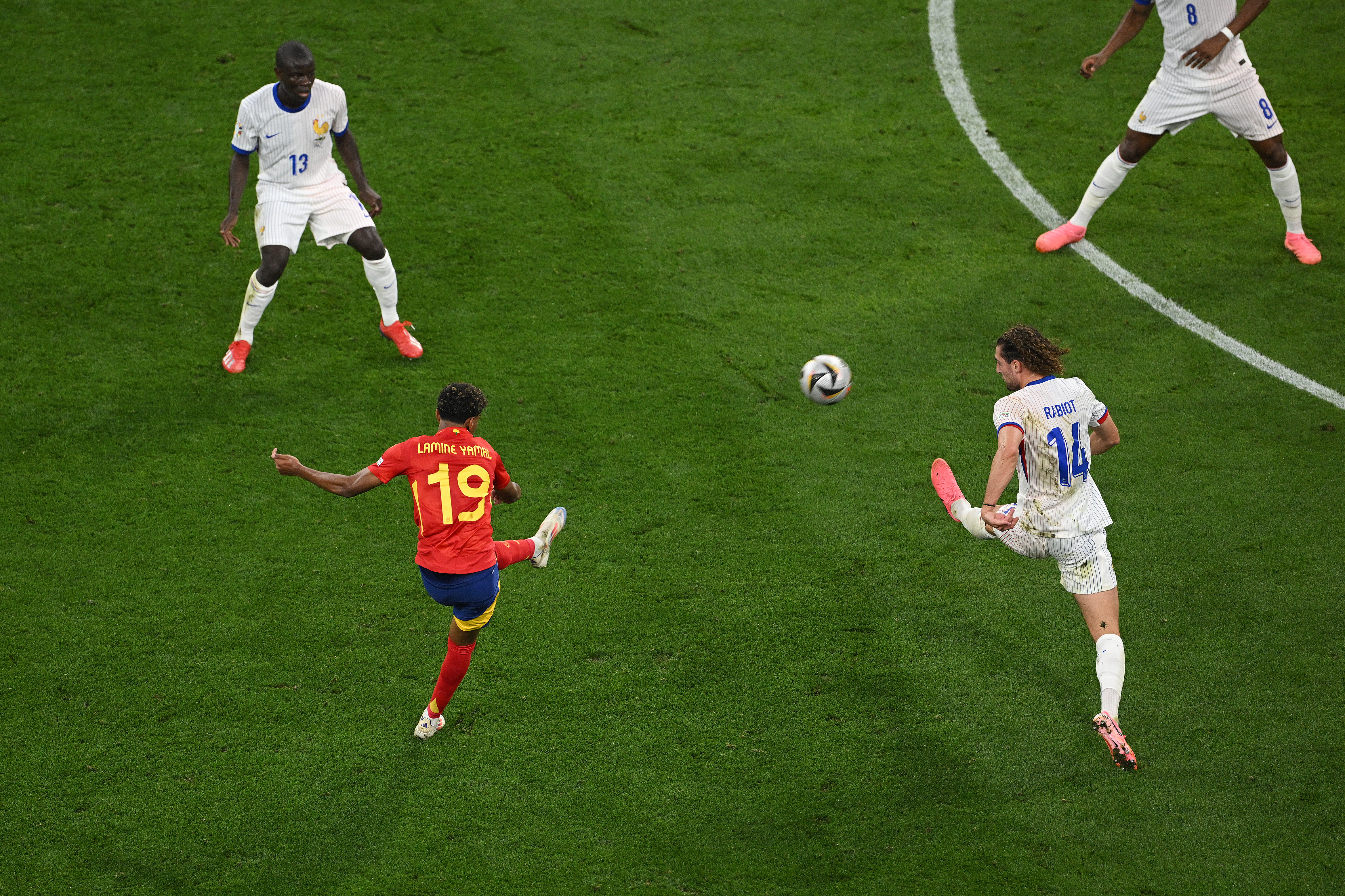 Lamine Yamal scores a left-footed curler from distance for Spain against France at Euro 2024.